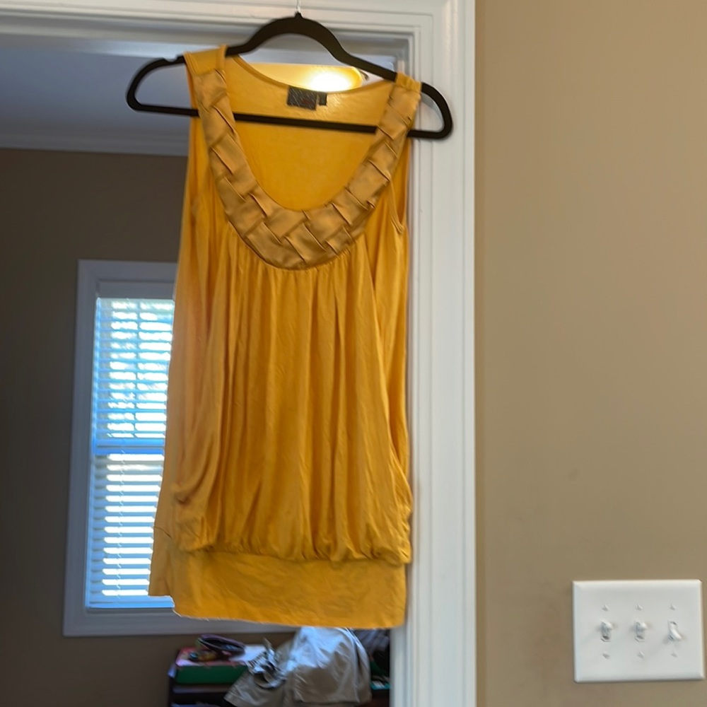 Gold sleeveless top
